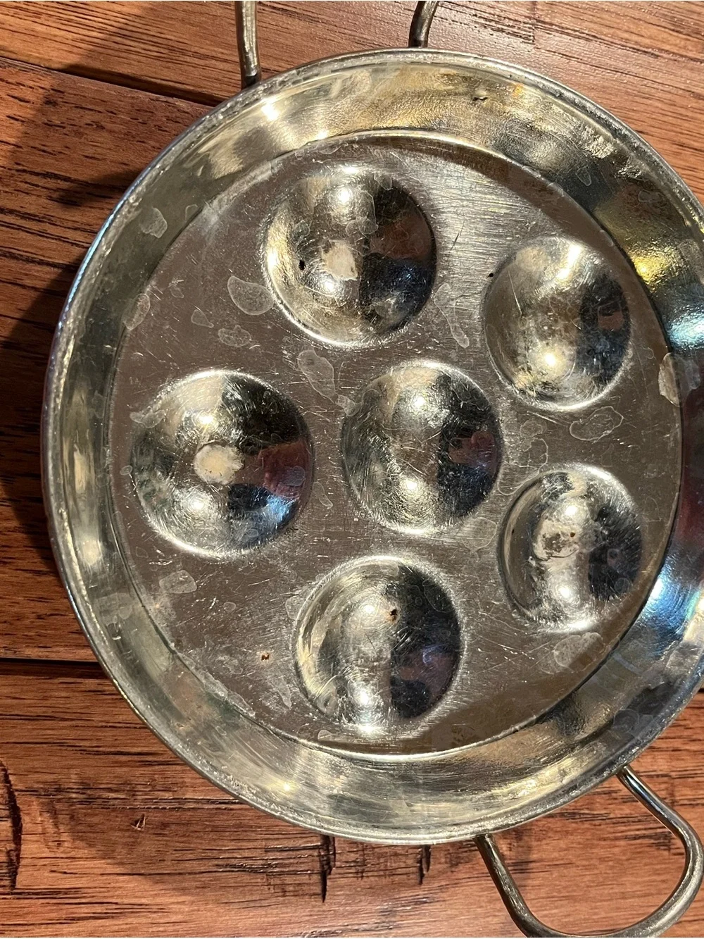 Escargot plates, shells and tongs.
